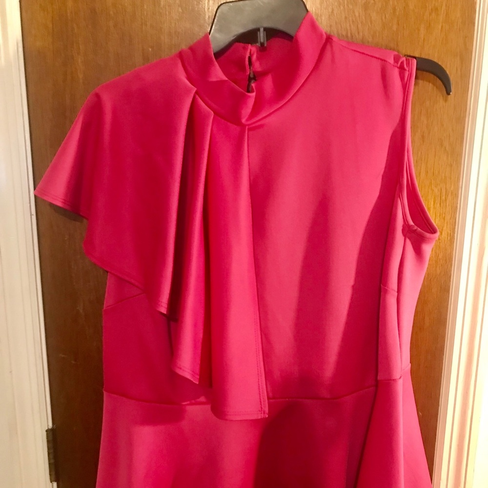 Pink peplum top with matching skirt